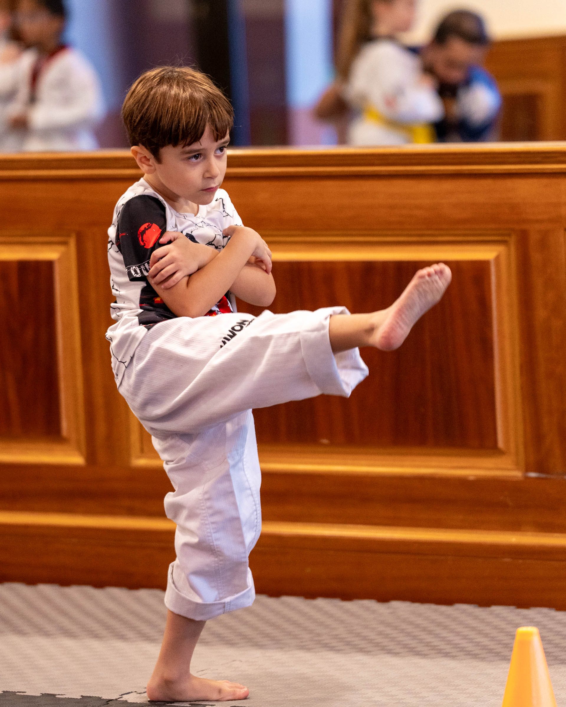 Young Taekwondo athlete in focused stance